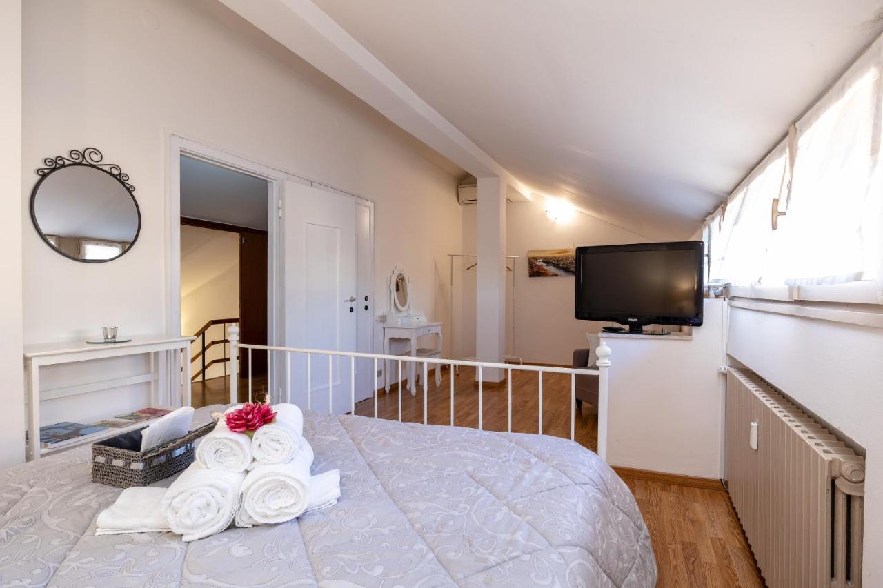 Attico Quarto Di Luna Verona Bagian luar foto