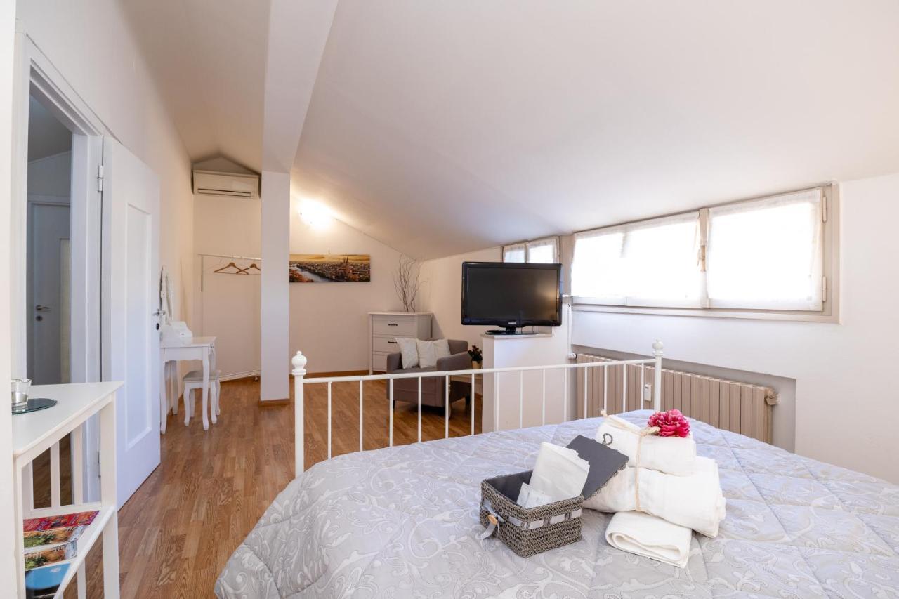 Attico Quarto Di Luna Verona Bagian luar foto